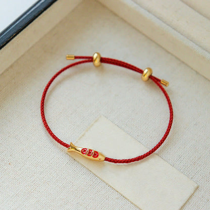 Satori Totem Brass Koi Fish Red String Bracelet