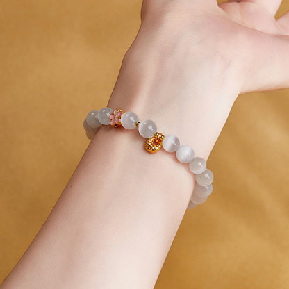 Satori Totem Sterling Silver Natural Peach Blossom White Cat's Eye Bracelet