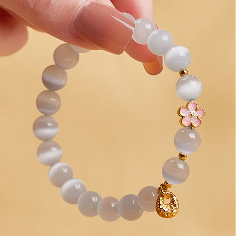 Satori Totem Sterling Silver Natural Peach Blossom White Cat's Eye Bracelet